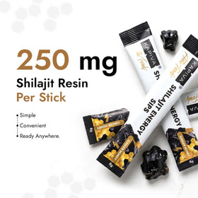 Sticks de miel Kapiva Shilajit sur une table avec d'autres compléments