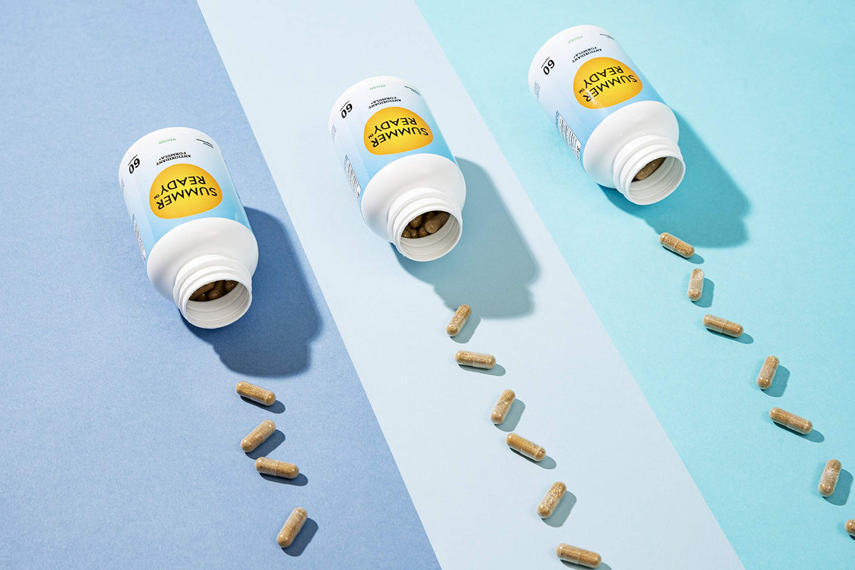 Summer Ready Capsules sur une surface en marbre
