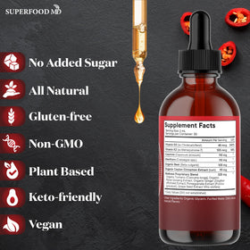 Superfood MD Complément Alimentaire Piment de Cayenne 180 ml sur une table en bois