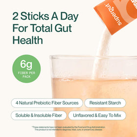Supergut Foundational Daily Fiber, stick pack dans un verre d'eau