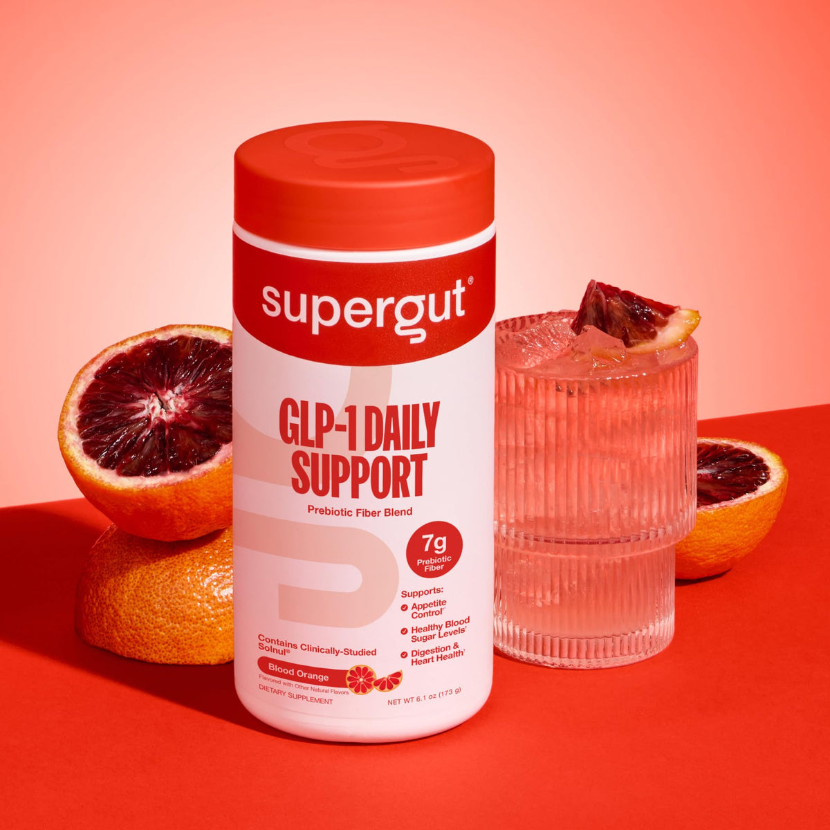Supergut GLP1 Daily Support poudre d'orange sanguine 240g dans un verre d'eau