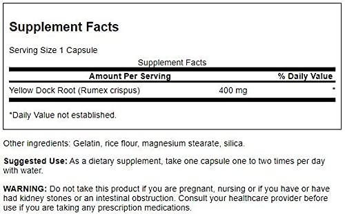 Swanson Racine de Jaune Dock 400 mg capsules ouvertes sur une table