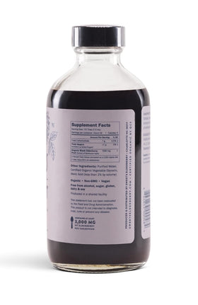 Sweet's Elderberry Extrait de Sureau Bio bouteille ouverte avec cuillère