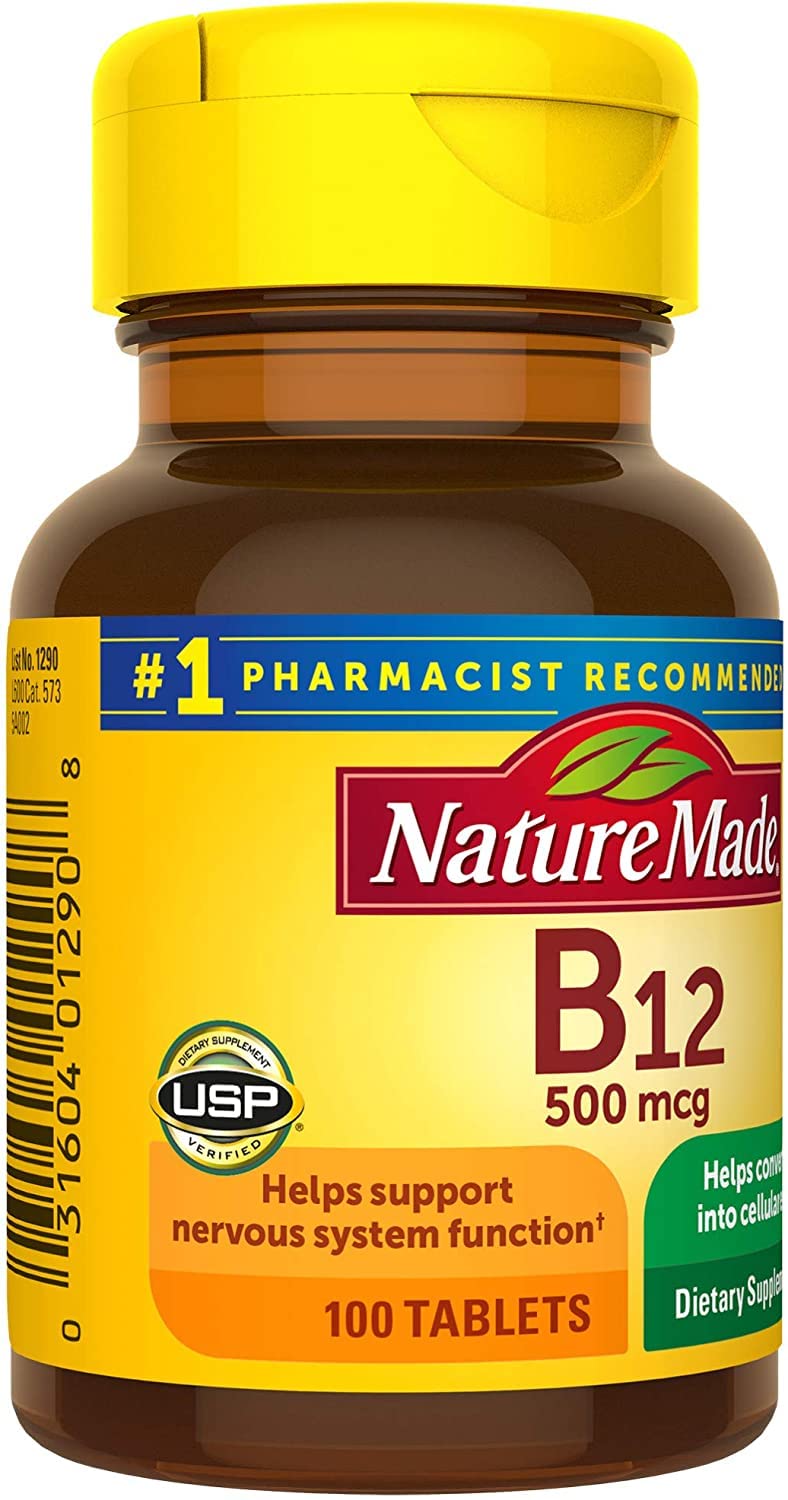 Tablette de vitamine B12 Nature Made sur une surface blanche
