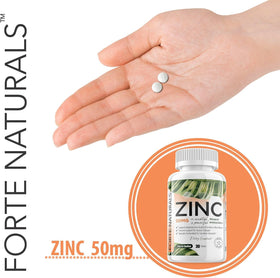 Tablettes de Zinc 50mg FORTE NATURALS avec une main tenant le flacon