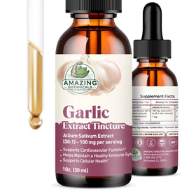 Teinture d'ail Amazing Botanicals sur une table avec des ingrédients naturels