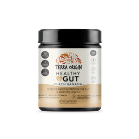 TERRA ORIGIN Healthy Gut Pêche Banane poudre sur une table