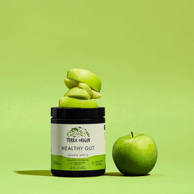TERRA ORIGIN Healthy Gut Poudre 320g avec un verre d'eau