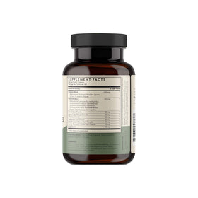 TERRA ORIGIN Multi-Enzymes capsules à côté d'un verre d'eau