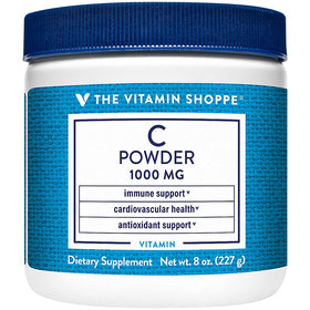 The Vitamin Shoppe Vitamine C 1 000mg Poudre 281g versée dans un verre d'eau