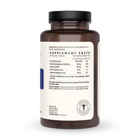 The Wellness Company Strong Bones capsules à l'intérieur de la bouteille
