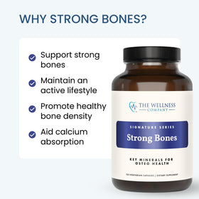 The Wellness Company Strong Bones sur une surface en bois