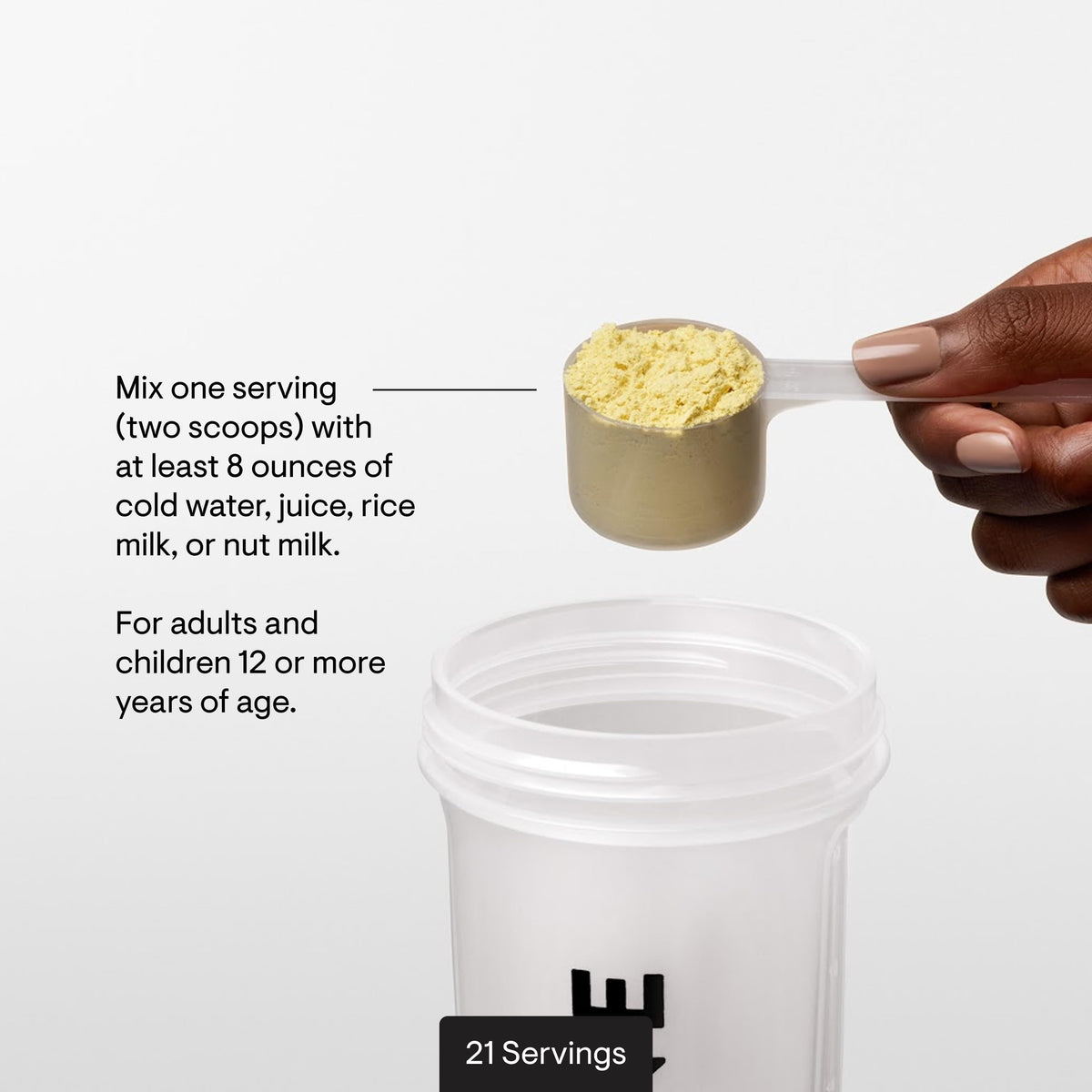 THORNE MediClear Plus poudre de protéines avec verre d'eau à côté
