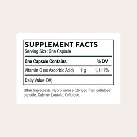 THORNE Vitamine C 1 000 mg, capsules ouvertes sur une table