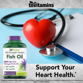 TNVitamins Huile de Poisson Omega-3 à côté d'un verre d'eau