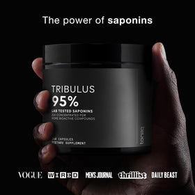 Toniiq Tribulus Terrestris 1300 mg à côté d'un verre d'eau