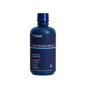 Trace Minerals Multivitamine Liquide 32 oz en ambiance de vie avec verre