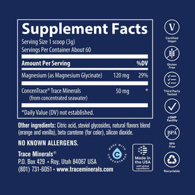 Trace Minerals Poudre de Magnésium Glycinate 240g à côté d'un verre d'eau