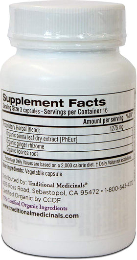 Traditional Medicinals Smooth Move Senna capsules on a wooden table