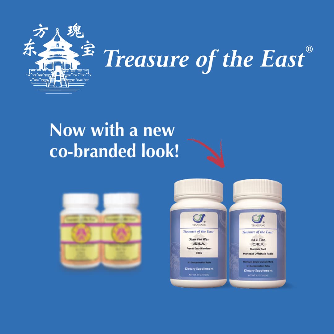 Treasure of the East Bupleurum Plus Dragon Bone capsules on a wooden surface