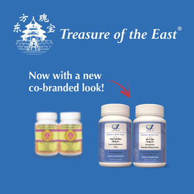 Treasure of the East Bupleurum Plus Dragon Bone capsules on a wooden surface