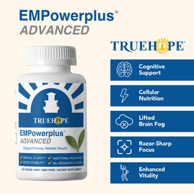 Truehope EMPowerplus 120 capsules sur une table en bois