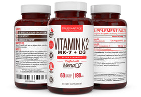 Truevantage Nutrition K2 MK-7 - gélules sur une table en bois