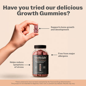 TruHeight Gummies de Croissance Acai sur une table avec des fruits