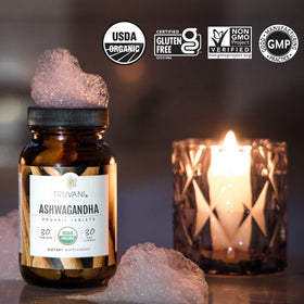 Truvani Ashwagandha Bio flacon avec arrière-plan naturel