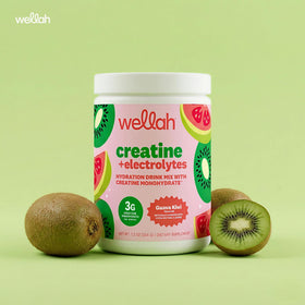 Un scoop de créatine Wellah sur une table