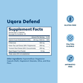 Uqora Defend 60 capsules à côté d'un verre d'eau