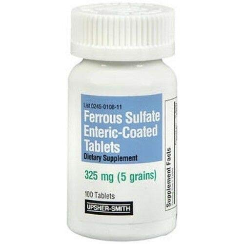 Usher-Smith Ferrous Sulfate 325mg comprimés sur une surface blanche