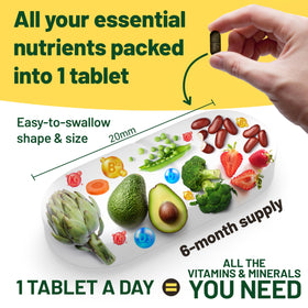 Vegan Vitality multivitamines montrant les comprimés à côté d'un verre d'eau