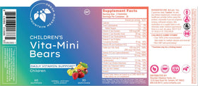 Vita-Mini Bears gummies in a child's hand