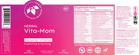 Vita-MOM Complément Alimentaire Prénatal gélules sur une table en bois