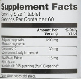 Vitacost Red Yeast Rice 1200 mg comprimés dans une main