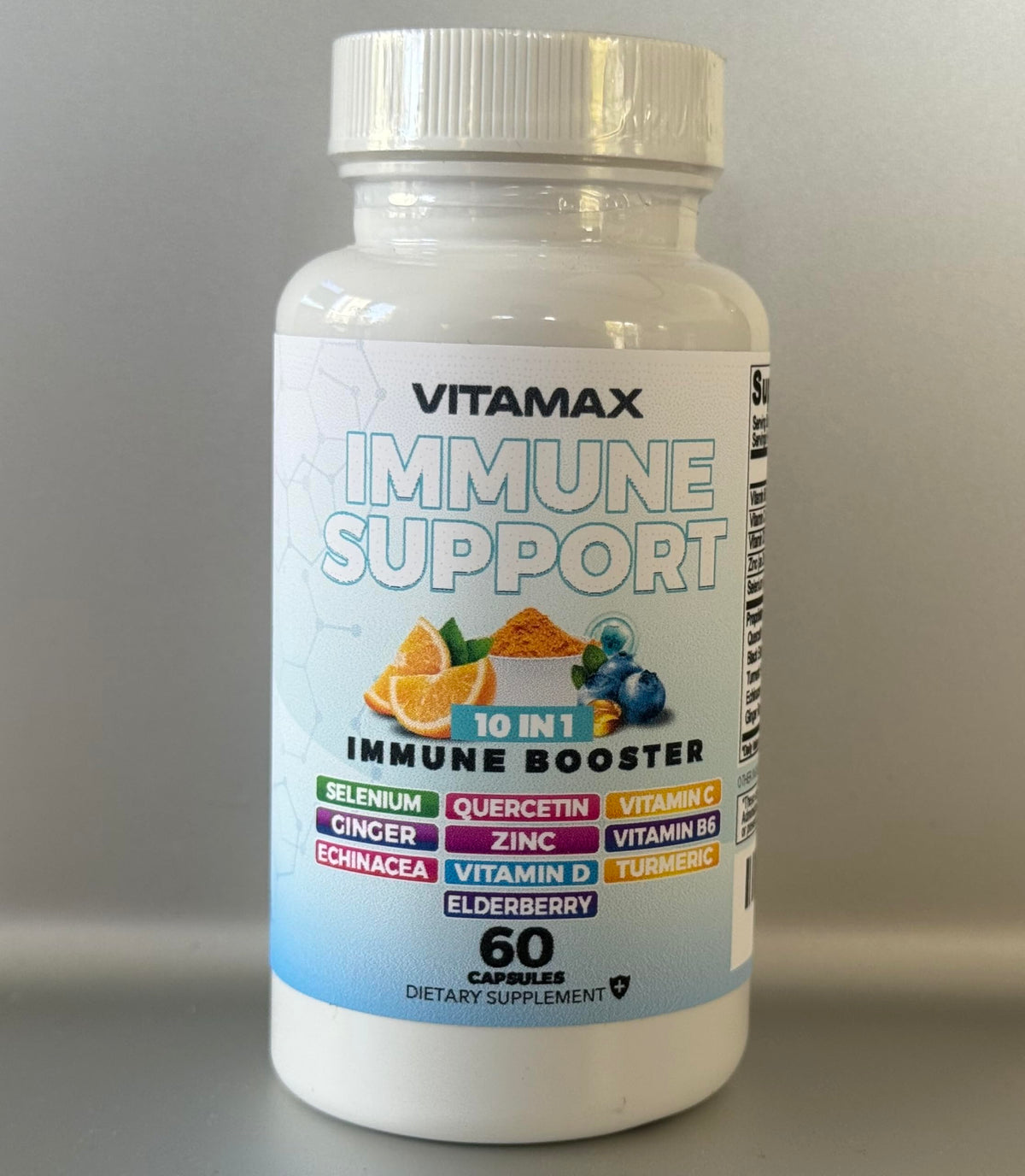 Vitamax Complément Alimentaire 10 en 1 capsules sur une table