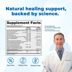 VitaMedica Clinical Support capsules à côté d'un verre d'eau