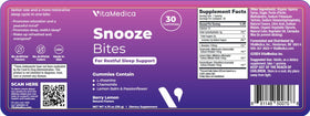 VitaMedica Snooze Gummies gummies on a wooden table