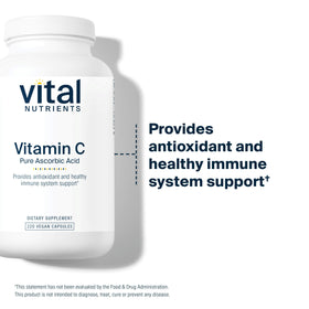 Vitamine C 1 000 mg Vital Nutrients sur une table en bois