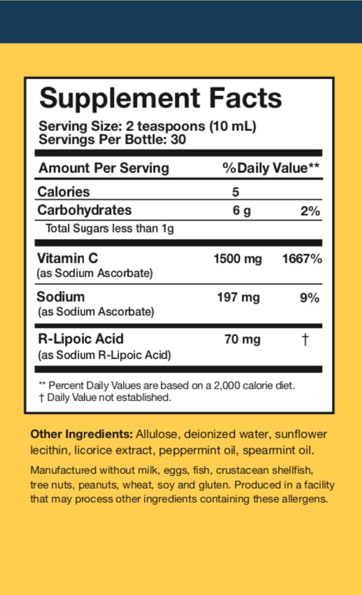 Vitamine C Liposomale C-RLA en verre avec une cuillère doseuse à côté