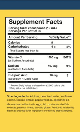 Vitamine C Liposomale C-RLA en verre avec une cuillère doseuse à côté