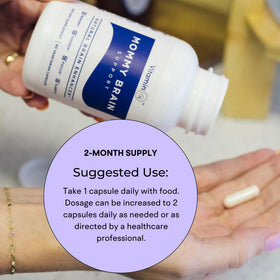 VitaminIQ Mommy Brain capsules sur une table