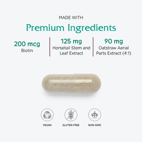 Vitanica Luminous capsules sur une surface en bois avec des plantes en arrière-plan