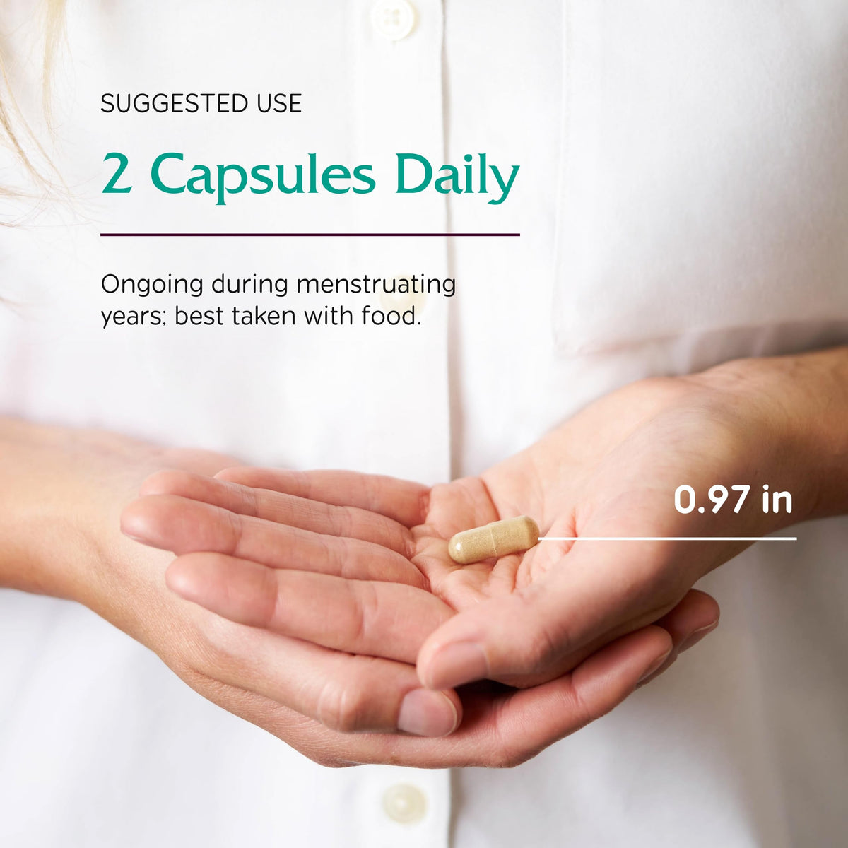 Vitanica Women's Phase I capsules dans une main