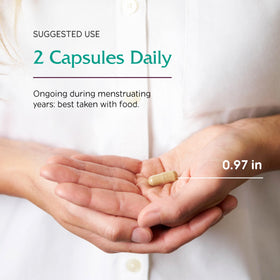 Vitanica Women's Phase I capsules dans une main