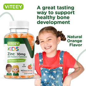 Viteey Gummies Zinc pour Enfants 10mg gummies à côté d'un verre d'eau