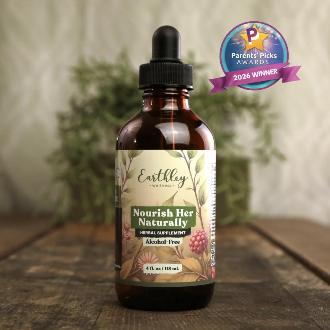 Vue arrière de la bouteille de 4oz de Nourish Her Naturally