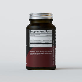 Vue de côté du pot de capsules de champignon Reishi bio