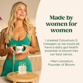 Vue de la poudre de colostrum bovin Bloom Nutrition sur une surface blanche